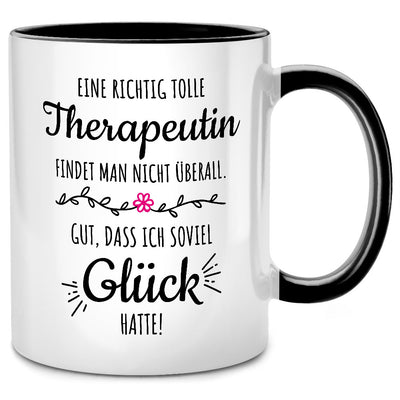 Eine richtig tolle Therapeutin findet man nicht überall, Tasse mit Spruch als Geschenk für Therapeut und Therapeutin, Schwarze Tasse
